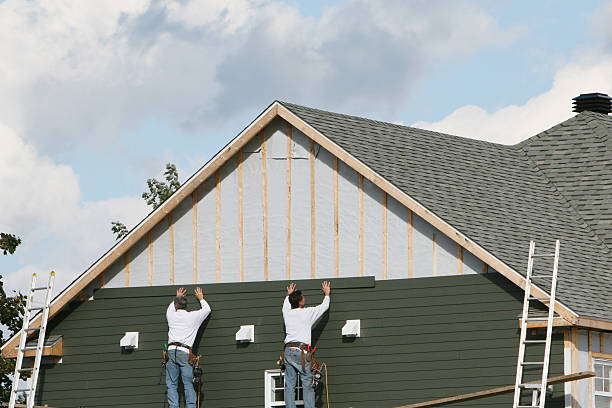 Professional Siding Installation technician working in Melcroft, PA